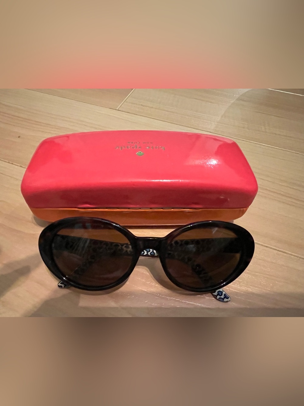 kate spade Black Oval Sunglasses with Pink Case and Orange Interior